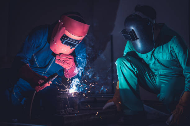 istock Metal welding steel works using electric arc welding machine 1273486026