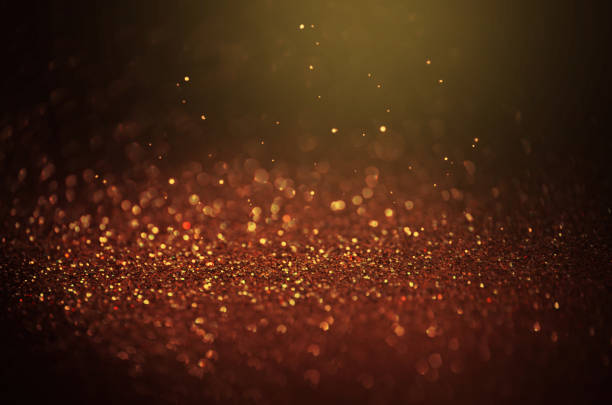 istock Romantic sparkling abstract bokeh on black background. Holiday and magic concept. 1273488168
