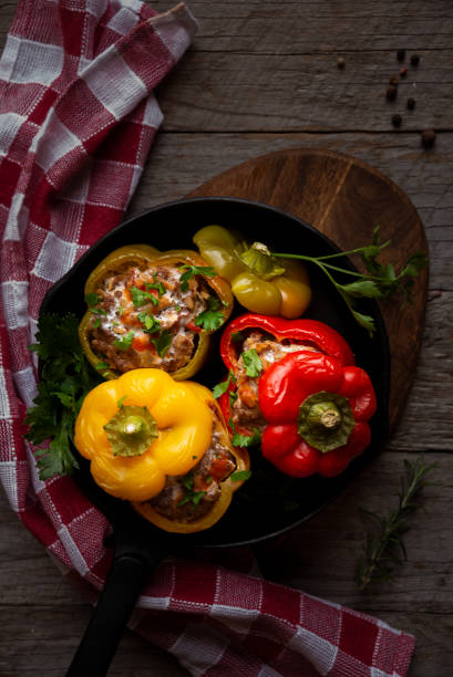 istock Bell peppers of different colors stuffed with meat 1273488267