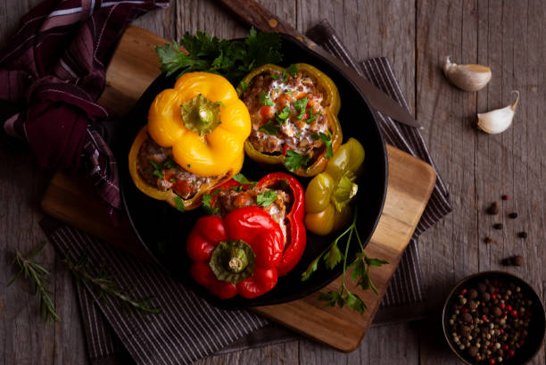 istock Bell peppers of different colors stuffed with meat 1273488305