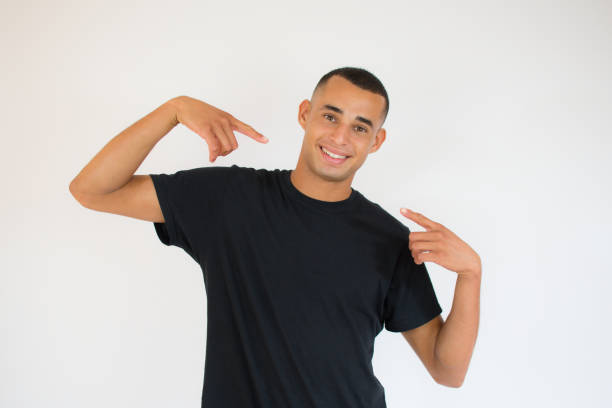 istock Young handsome man over isolated background smiling confident showing and pointing with fingers teeth and mouth 1273489999