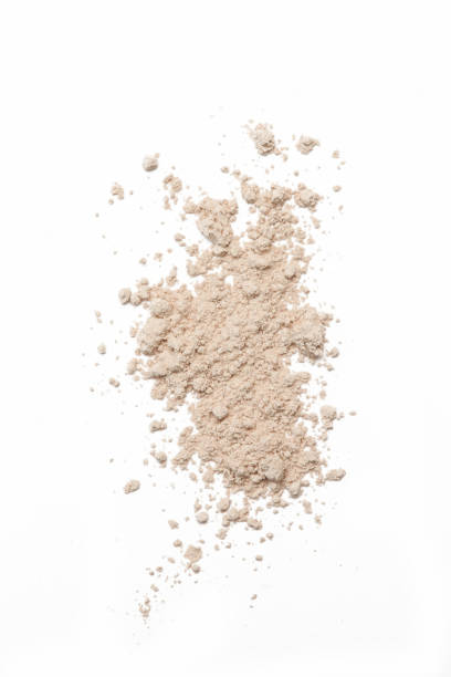 istock Beige cosmetic or make up powder isolated on white. 1273491993