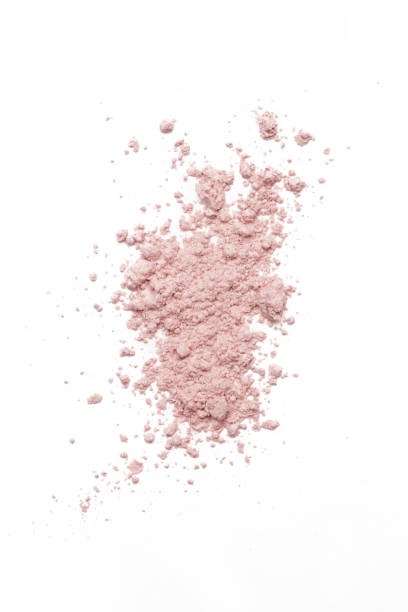 istock Beige cosmetic or make up powder isolated on white. 1273492020