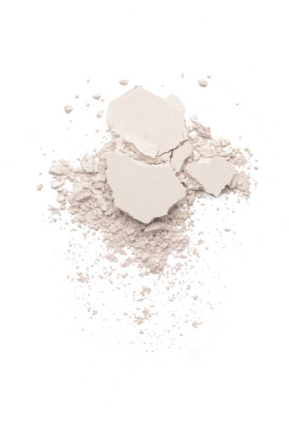 istock Beige cosmetic or make up powder isolated on white. 1273492333