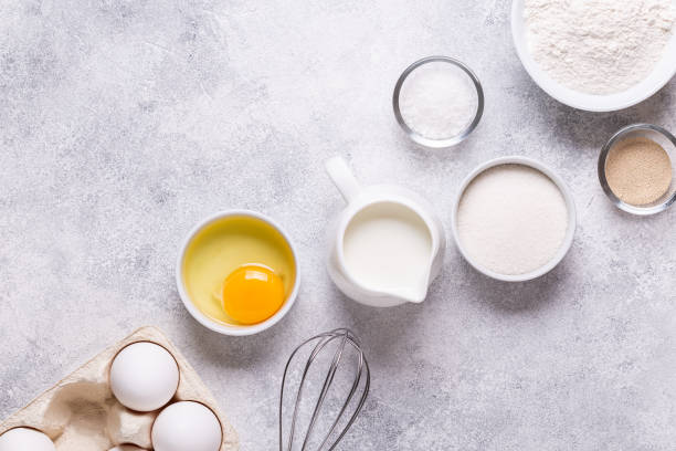 istock Ingredients for baking  - flour, eggs, salt, sugar, milk 1273493281