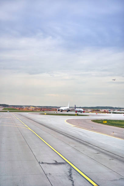 istock airplane on the ground at the airport 1273496237