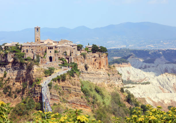 istock village perched on the hill that can only be reached by a narrow 1273498991