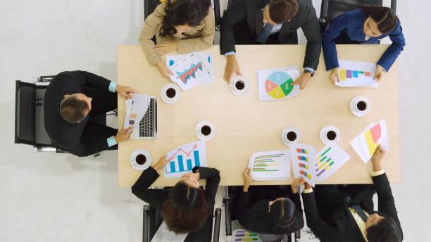 istock Business people group meeting shot from top view 1273500034