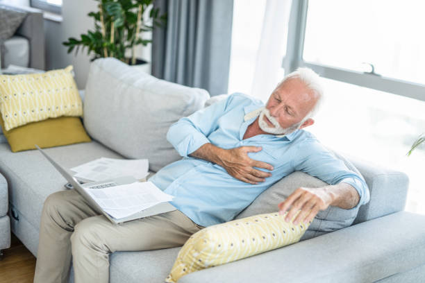 istock Senior man having having too many bills to pay and having heart attack 1273508444