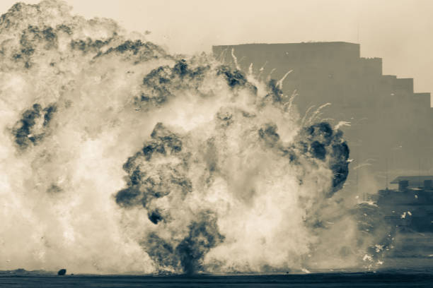 istock Massive fire explosion or strike in military combat and war. Vehicle explosion from a tank in a city in the Middle East. Military Concept. Strength, power, explosion. 1273508865