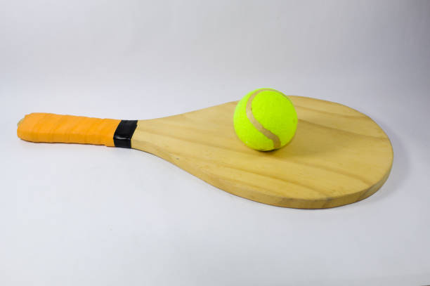 istock Beach tennis racket and ball with white background 1273512614