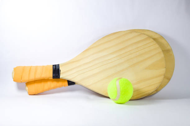 istock Beach tennis racket and ball with white background 1273512630