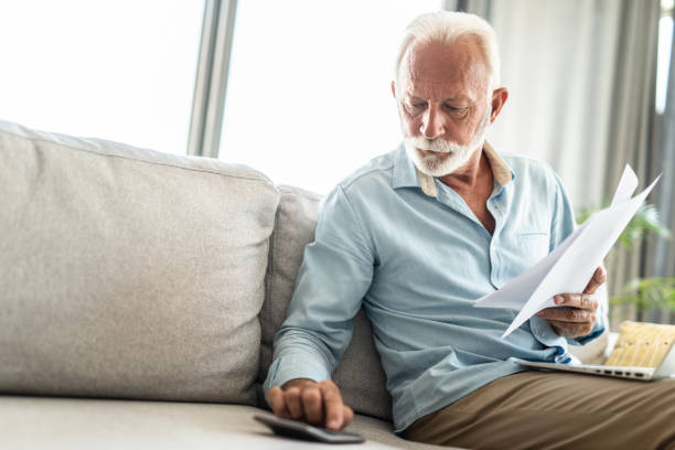 istock Senior man taking care of bills 1273512692