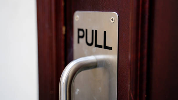 istock Push and pull sign on a door at a apartment. 1273517779