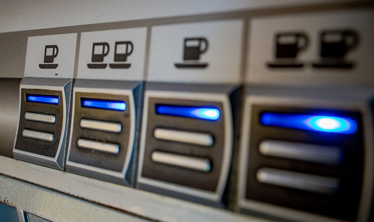 background image of coffee machine buttons.
