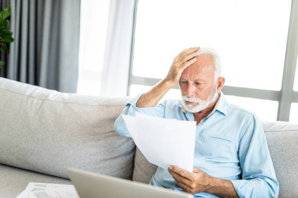 istock Senior man taking care of bills 1273519015