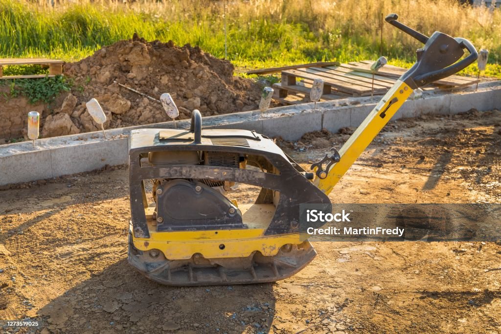 Compactor Pad Construction Vibratory Plate Compactor Under Construction Vibratory Plate Compactor ...