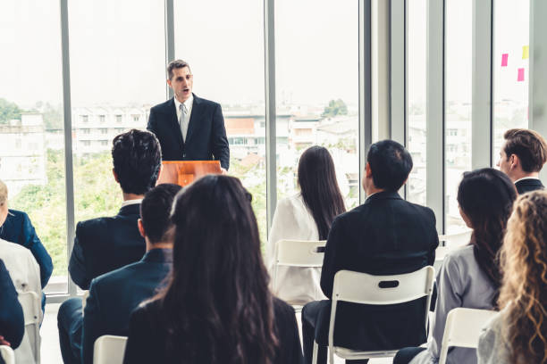 istock Group of business people meeting in a seminar conference 1273525607