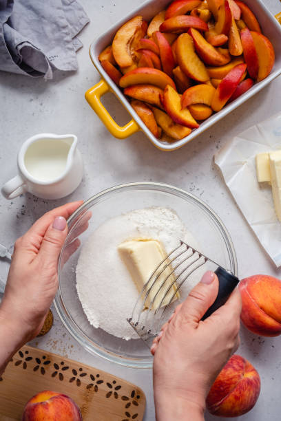 istock Ingredients for peach cobbler pie 1273525614