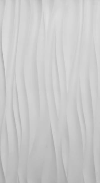 istock Wavy background. Interior wall decoration or panel pattern. white background of abstract waves. 1273528786