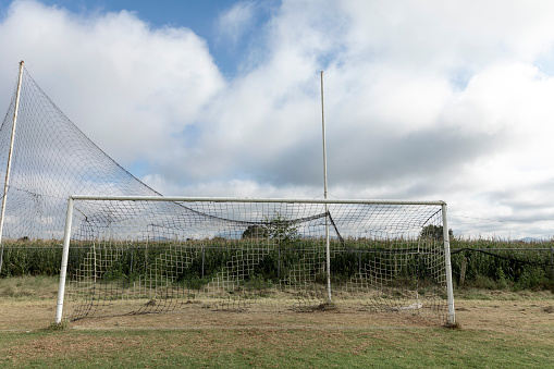 old and forgotten soccer goal.