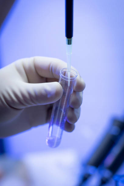 istock Man Technician in biology managing high-tech laboratory equipment 1273532920