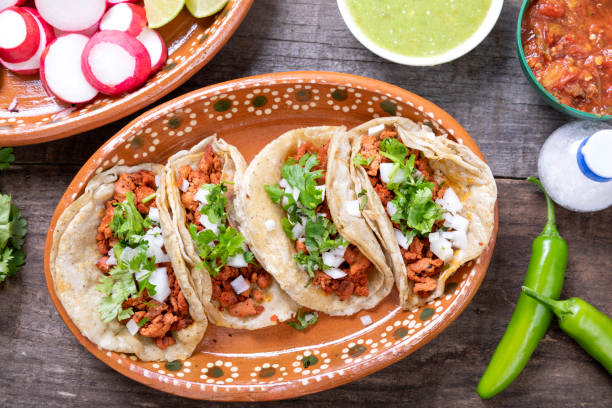 istock Typical Mexican food dishes with sauces on colorful table 1273533144