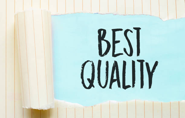 istock The text BEST QUALITY appearing behind torn white paper 1273534475