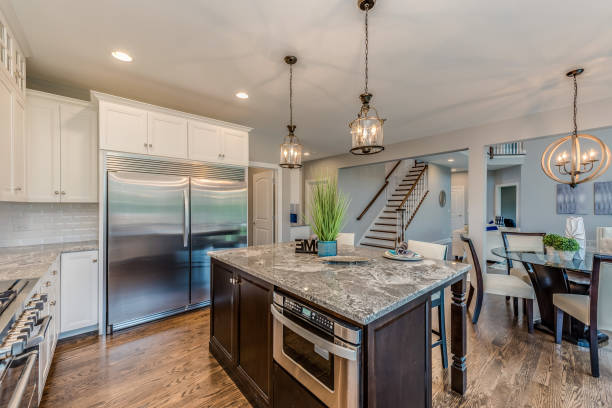 istock Big kitchen with a smaller island and open layout 1273549220