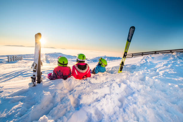 istock Mother with kids on skiing 1273549282