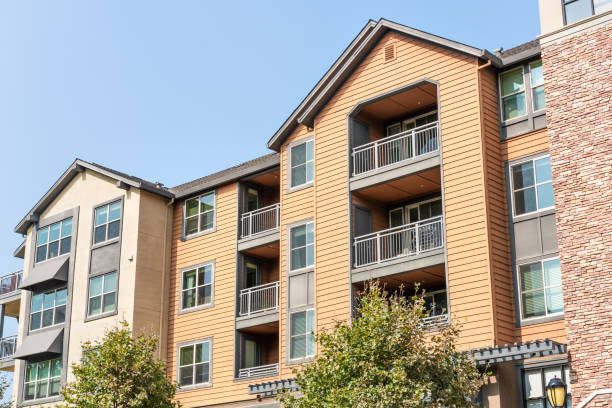 Exterior view of modern apartment building Exterior view of modern apartment building offering luxury rental units in Silicon Valley; Redwood City, San Francisco bay area, California townhouse photos stock pictures, royalty-free photos & images