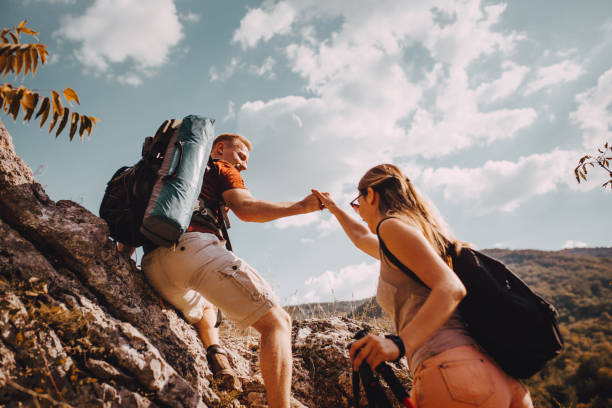 istock Couple in the mountain 1273556023