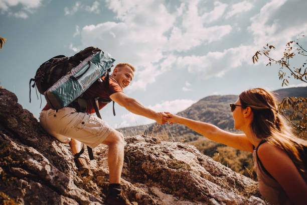 istock Couple in the mountain 1273556690
