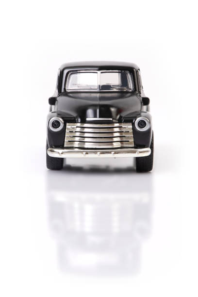 istock Front view of black old style model pickup truck on white background. 1273563507