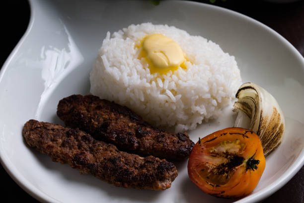 istock beef kebab with buttered rice, grilled tomato and onion 1273566663