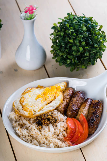 istock skinless longanisa (pork or chicken meat) with fried egg 1273566787