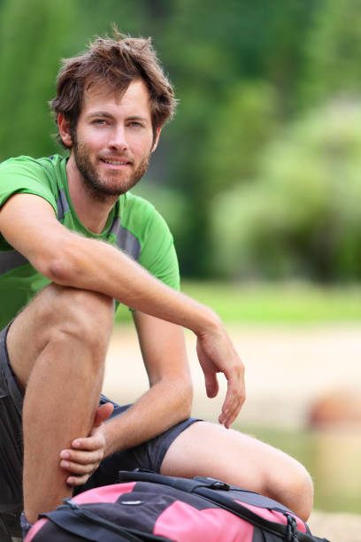 istock Hiking man portrait relaxing with backpack 1273572682
