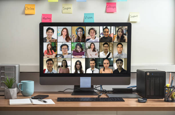 Computer desktop with Stationery and device showing the diversity people with their friend via video conference