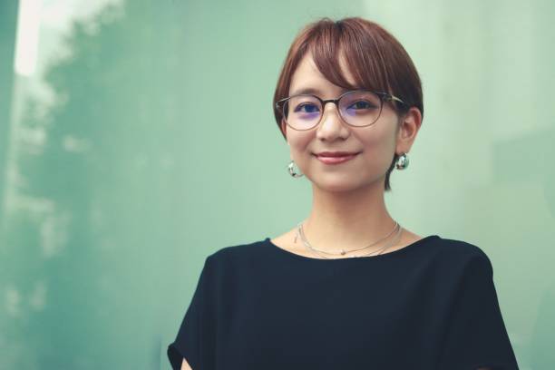 Portrait of young business woman wearing Smart casual clothes Young asian business woman looking at camera wearing smart casual clothes japanese woman stock pictures, royalty-free photos & images