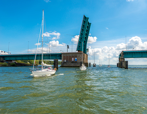 The famous Haringvliet Bridge in the Netherlands opened up for the passage of sailboats
