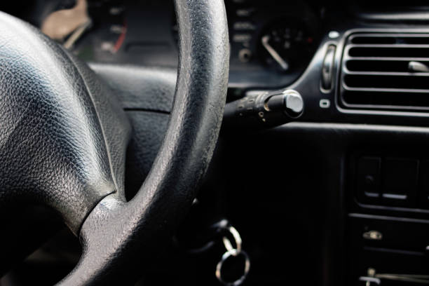 istock Black steering wheel in the car closeup 1273587970