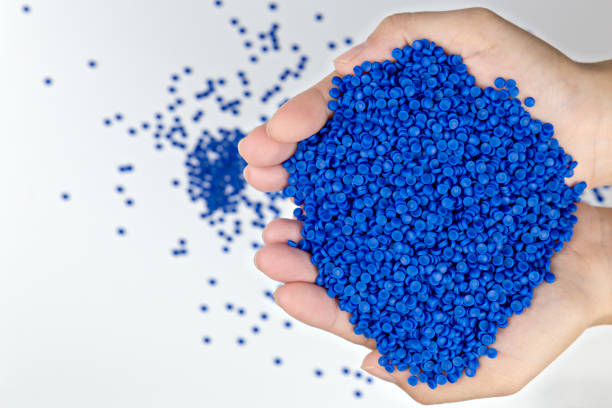 istock Close-up of plastic polymer granules. hand hold Polymer pellets. polymer plastic. compound polymer. 1273589981