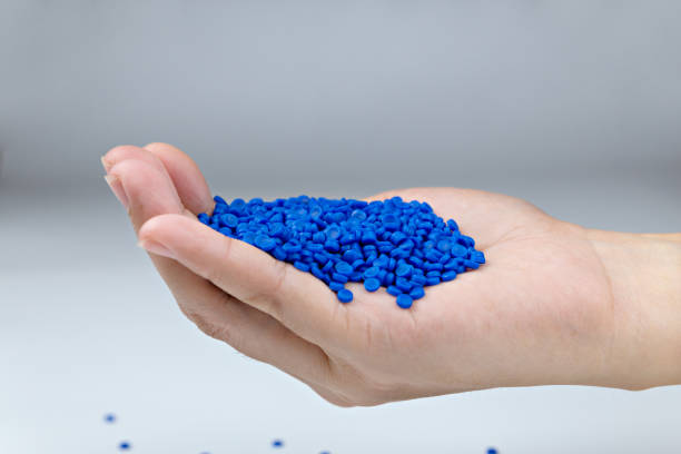 istock Close-up of plastic polymer granules. hand hold Polymer pellets. polymer plastic. compound polymer. 1273590016