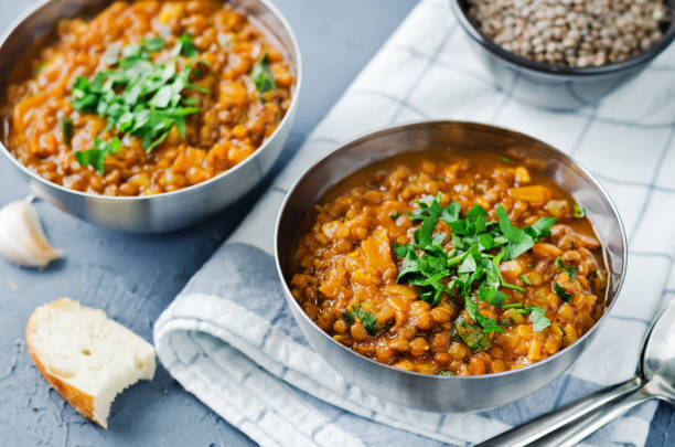istock Cabbage Lentil stew in a bowl with parsley 1273594781