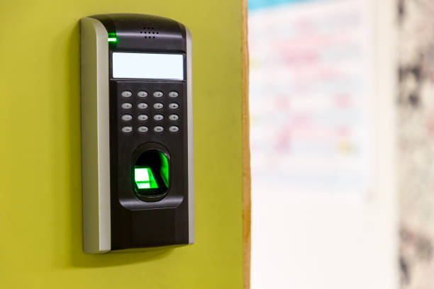 istock Finger scan on machine Security concept and safety. soft focus on hand scanning finger on machine concept. Businessman hand scanning finger on machine, Technology concept or Business concept. 1273605046