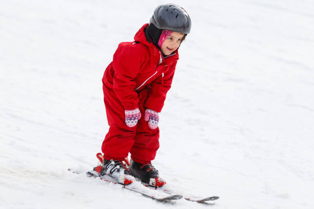 istock Little girl on ski 1273605954