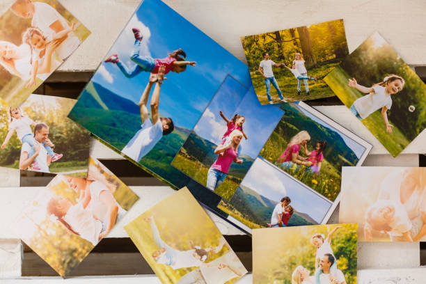 istock Frame with old paper and photos. Objects over wooden planks 1273609523