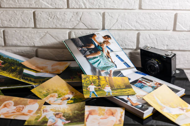 istock Frame with old paper and photos. Objects over wooden planks 1273609555