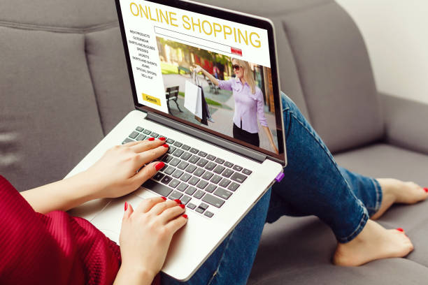 istock Online Shopping Website on laptop.Young woman hands using laptop computer. 1273611636