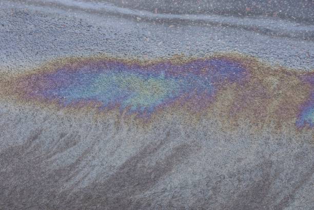 istock big colored oil stain on the asphalt 1273612777